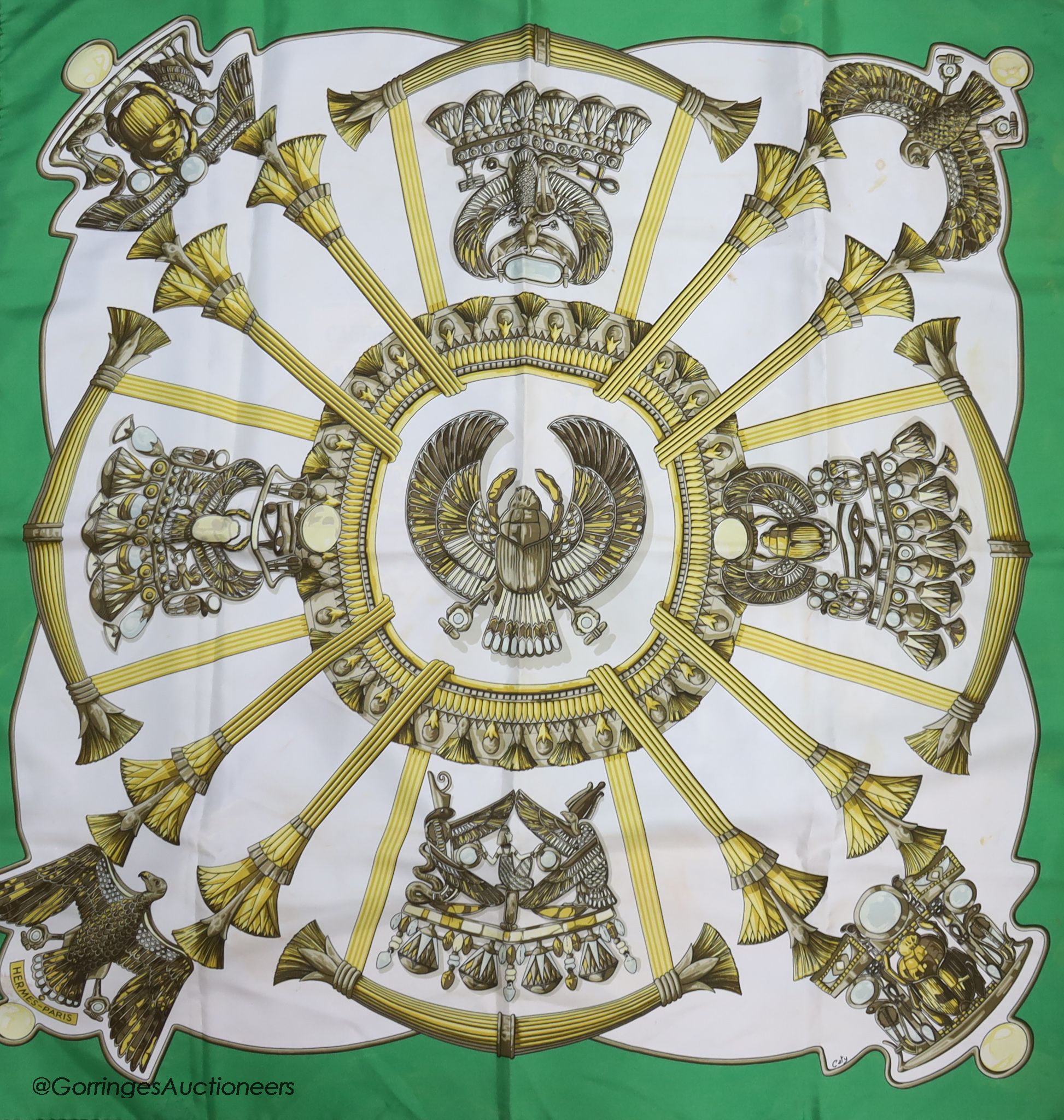 Three vintage Hermes silk scarves, 'Scarabee et Pectoraux' (gold, green, white), 'Carrousel' (green ground), and 'Sangles' (multi)